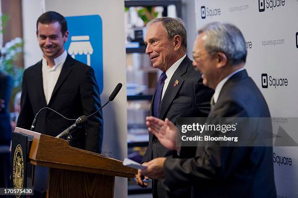 Jack Dorsey, chairman and co-founder of Twitter Inc., left, and and San Francisco Mayor Edward "Ed" Lee, right, laugh as New York City Mayor Michael...