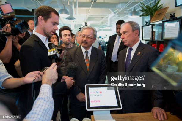 Jack Dorsey, chairman and co-founder of Twitter Inc., left, speaks to the media as New York City Mayor Michael "Mike" Bloomberg, right, and San...