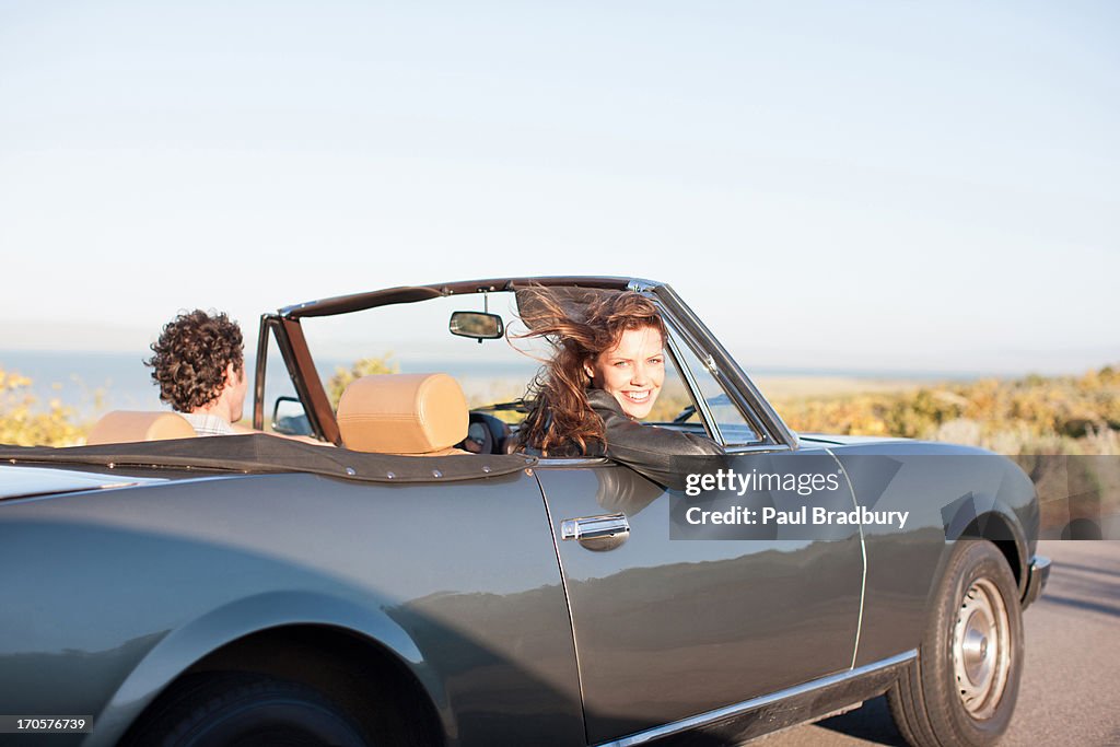 Couple riding in car  together