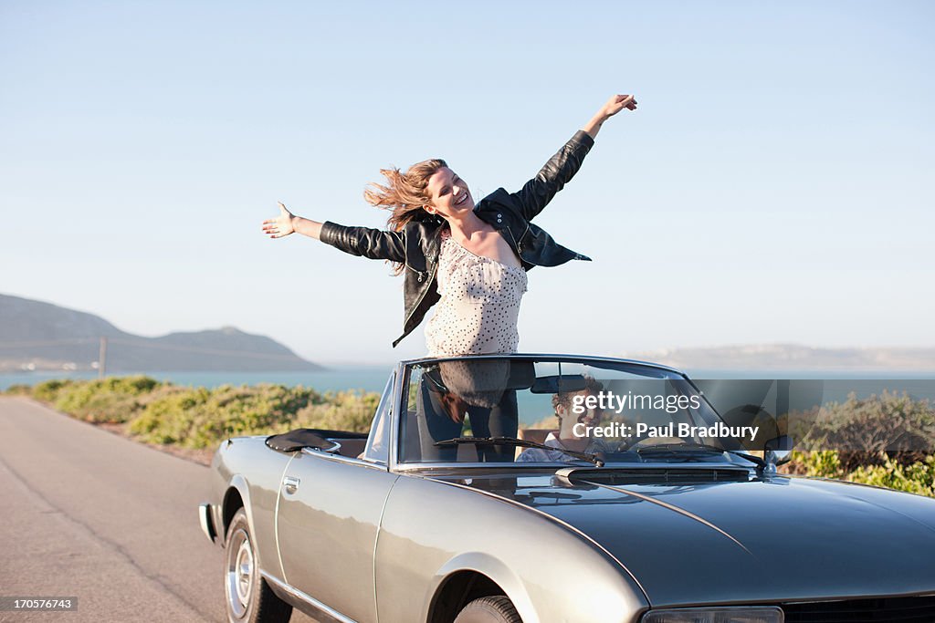 Couple riding in car  together