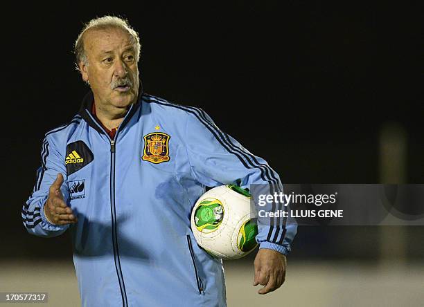 Spanish coach Vicente Del Bosque gestures during a training session at the Wilson Campos Training Center near Recife, northeastern Brazil, on June...