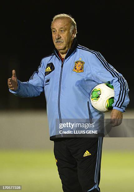 Spanish coach Vicente Del Bosque gestures during a training session at the Wilson Campos Training Center near Recife, northeastern Brazil, on June...