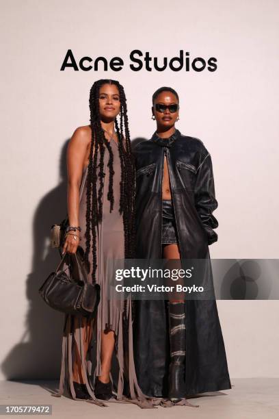 Zazie Beetz and Taylour Paige attend the Acne Studios Womenswear Spring/Summer 2024 show as part of Paris Fashion Week on September 27, 2023 in...