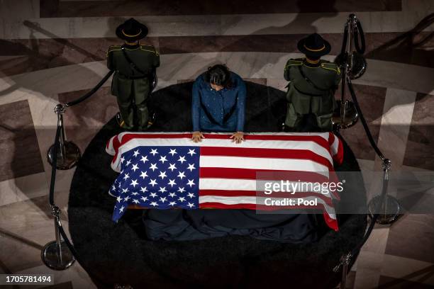 San Francisco Mayor London Breed prays over the casket of the late Senator Dianne Feinstein at San Francisco City Hall before a public viewing on...