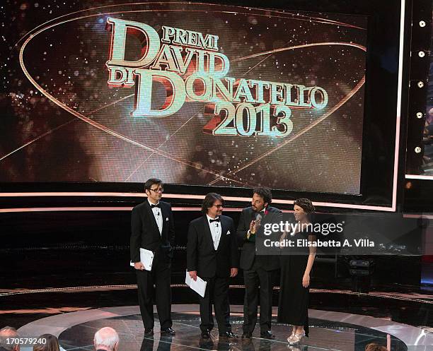 Actress Maya Sansa receives the award for the best actress during the 2013 Premi David di Donatello Ceremony Awards at Dear RAI Studios on June 14,...