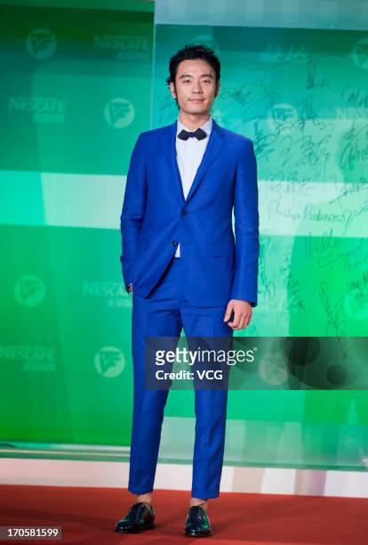 Li Guangjie attends the clothing ceremony of the 19th Shanghai TV Festival at Himalayan Art Center on June 14, 2013 in Shanghai, China.