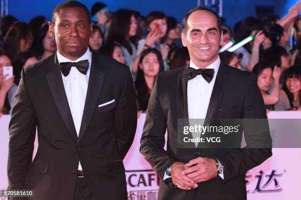 David Harewood and Navid Negahban attend the clothing ceremony of the 19th Shanghai TV Festival at Himalayan Art Center on June 14, 2013 in Shanghai,...