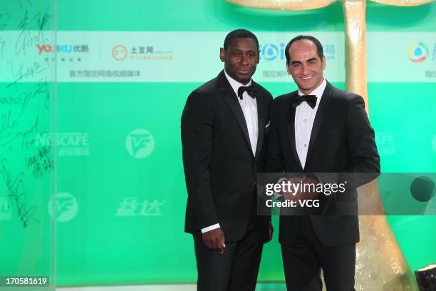 David Harewood and Navid Negahban attend the clothing ceremony of the 19th Shanghai TV Festival at Himalayan Art Center on June 14, 2013 in Shanghai,...