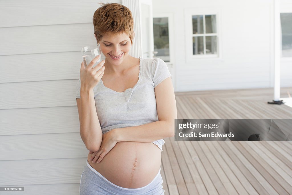 Pregnant woman drinking water