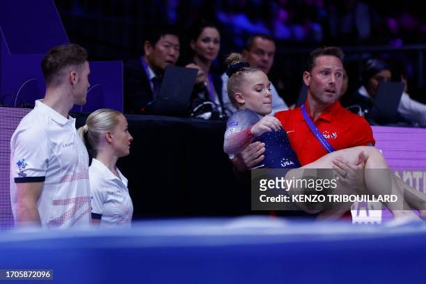 Joscelyn Roberson is evacuated after training on the Vault in the Women's Team Final during the 52nd FIG Artistic Gymnastics World Championships, in...