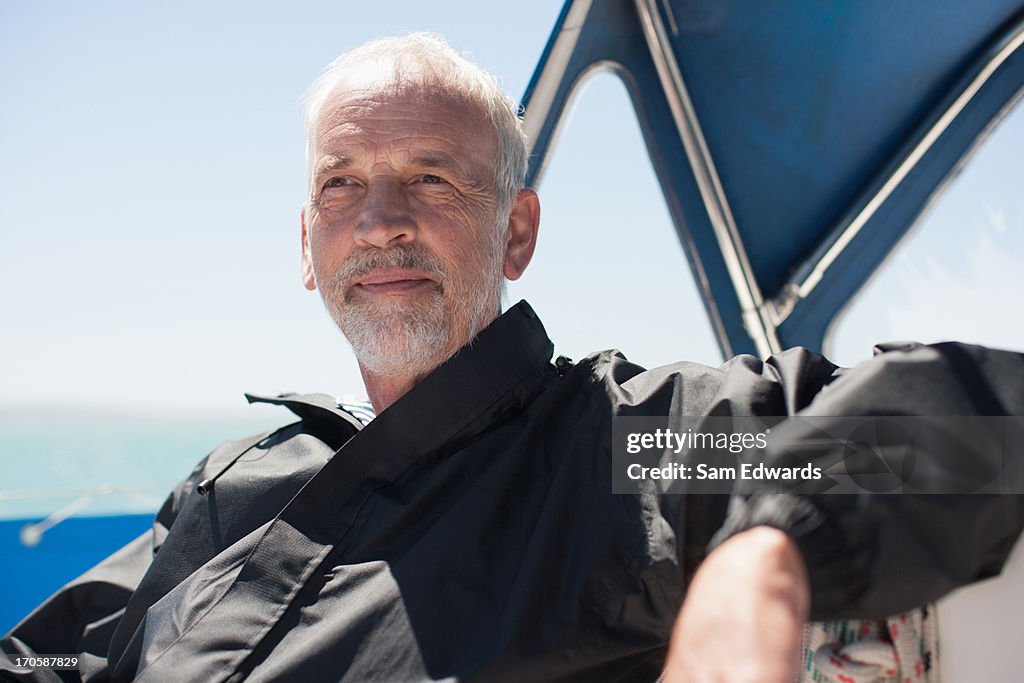 Mature man on sailboat