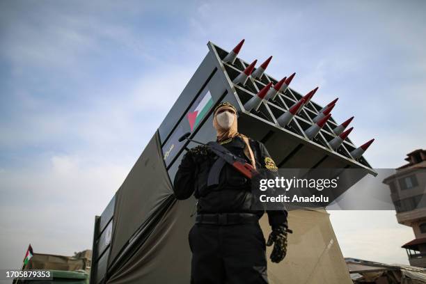 Heavy weapons and missiles are exhibited during the military parade as Al-Quds Brigades taking part on the occasion of the 36th anniversary of the...