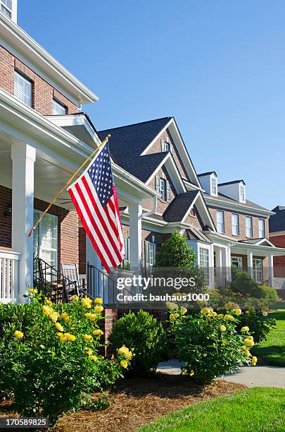 the american dream - american flag house stock pictures, royalty-free photos & images