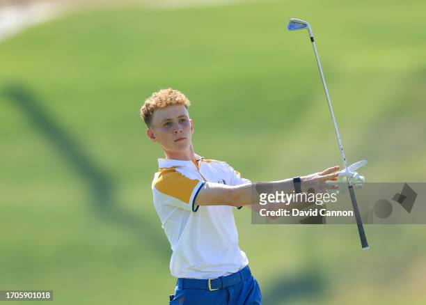 Sean Keeling of The European Team plays his second shot on the 12th hole in his match against Will Hartman during the singles matches on day three of...