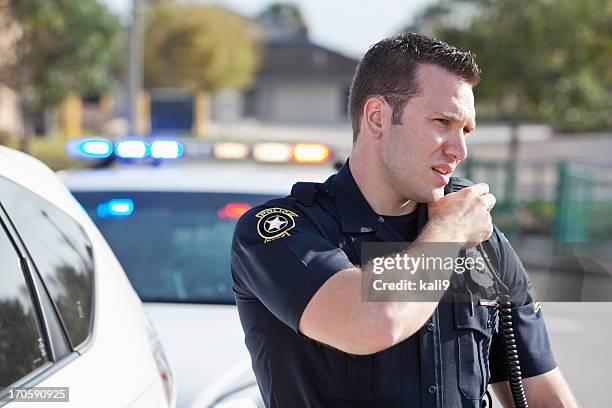 police officer - walkie talkie stock pictures, royalty-free photos & images