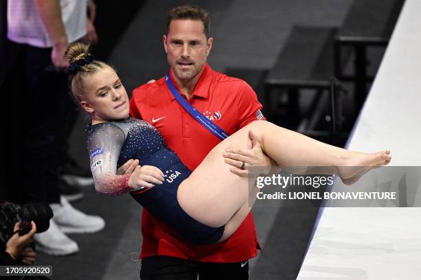 Joscelyn Roberson is evacuated after training on the Vault in the Women's Team Final during the 52nd FIG Artistic Gymnastics World Championships, in...