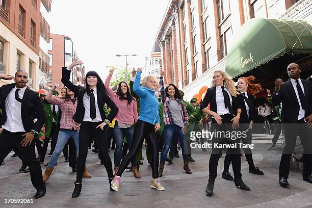 Green Man 'flash mob' dance launches Harrods Summer Sale at Harrods on June 15, 2013 in London, England.