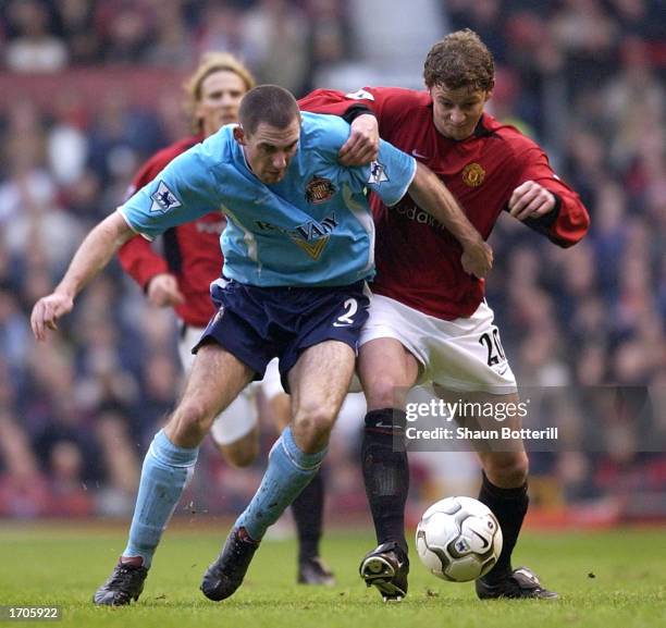 Stephen Wright of Sunderland is challenged by Ole Gunnar Solskjaer of Manchester United during the Manchester United v Sunderland FA Barclaycard...