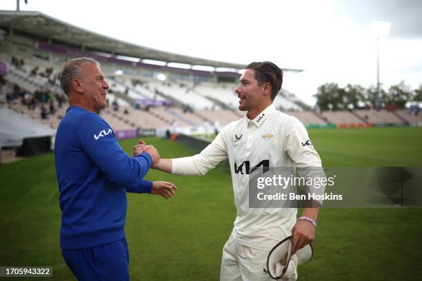 Surrey Director of Cricket Alec Stewart celebrates with Rory Burns of Surrey after Surrey clinch the LV= Insurance County Championship title during...