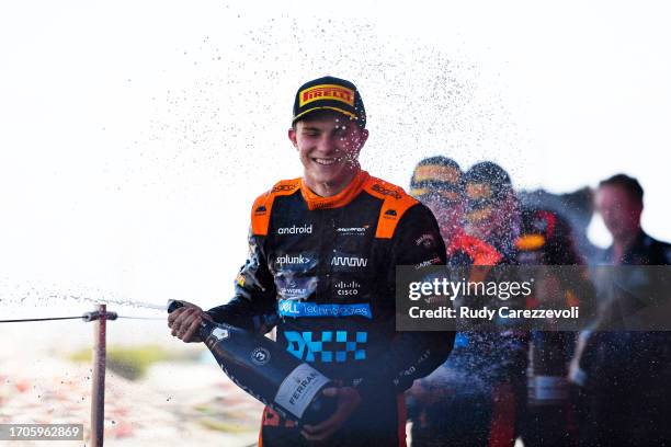 Third placed Oscar Piastri of Australia and McLaren celebrates on the podium during the F1 Grand Prix of Japan at Suzuka International Racing Course...