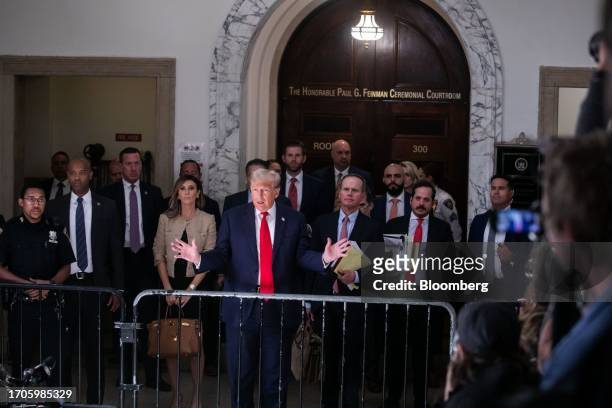 Former US President Donald Trump speaks to members of the media at New York State Supreme Court in New York, US, on Wednesday, Oct. 4, 2023. Donald...