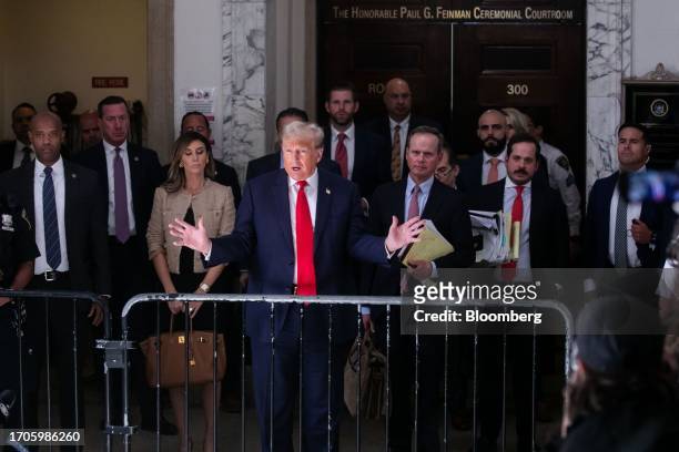 Former US President Donald Trump speaks to members of the media at New York State Supreme Court in New York, US, on Wednesday, Oct. 4, 2023. Donald...