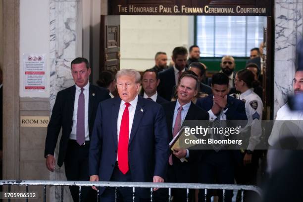 Former US President Donald Trump exits a court room at New York State Supreme Court in New York, US, on Wednesday, Oct. 4, 2023. Donald Trump is...