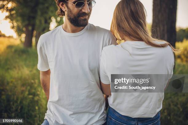 modern people in nature - blank t shirt stock pictures, royalty-free photos & images