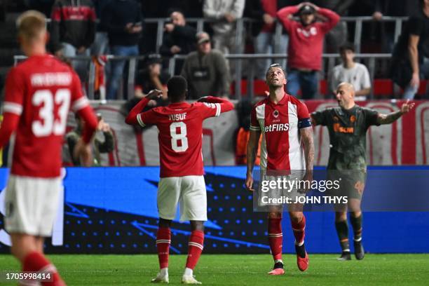 Antwerp's Belgian defender Toby Alderweireld reacts after missing a penalty during the UEFA Champions League Group H football match between Royal...