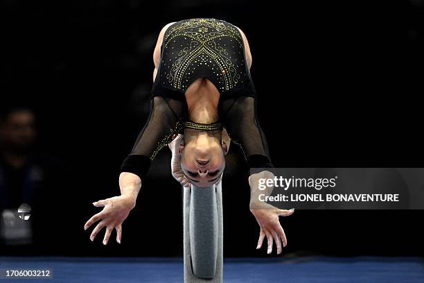 Brasil's Flavia Saraiva competes on the Balance Beam in the Women's Team Final during the 52nd FIG Artistic Gymnastics World Championships, in...