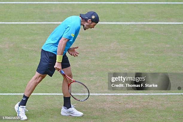Tommy Haas of Germany reacts annoyed in his half final match against Roger Federer of Switzerland during day six of the Gerry Weber Open at Gerry...