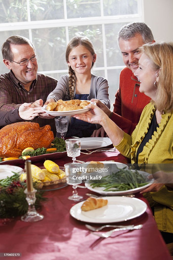 Multigeneration Family Enjoying Holiday Dinner High-Res Stock Photo