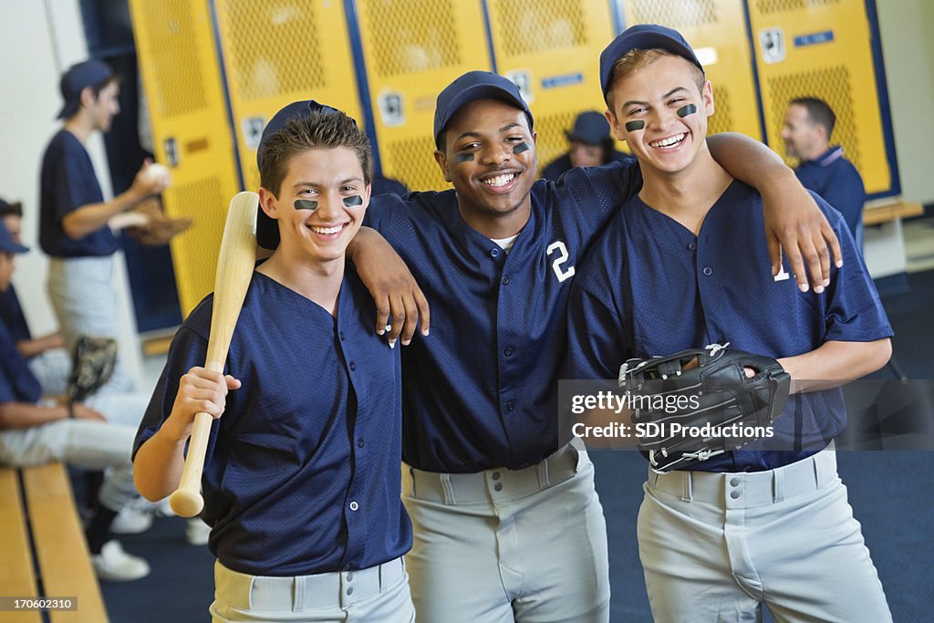 Diverse high school baseball players in locker room