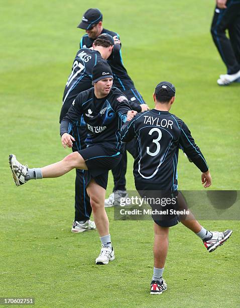 Doug Bracewell limbers up alongside Ross Taylor during the New Zealand nets session at the SWALEC Stadium on June 15, 2013 in Cardiff, Wales.