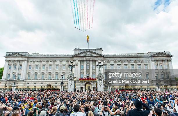 The Red Arrows flypast during the annual Trooping The Colour ceremony at Buckingham Palace on June 15, 2013 in London, England.