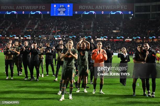 Shakhtar Donetsk's players celebrate after winning the UEFA Champions League Group H football match between Royal Antwerp Football Club and FC...