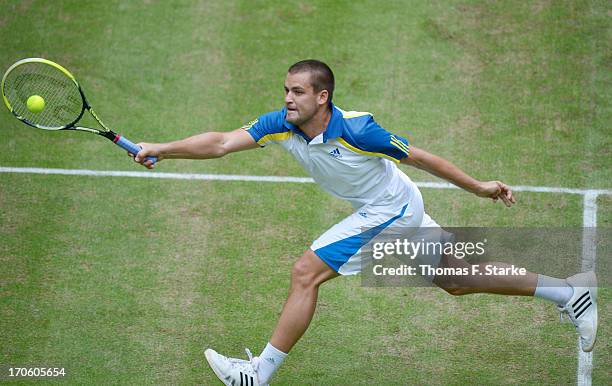 Mikhail Youzhny of Russia plays a fronthand in the half final match against Richard Gasquet of France during day six of the Gerry Weber Open at Gerry...