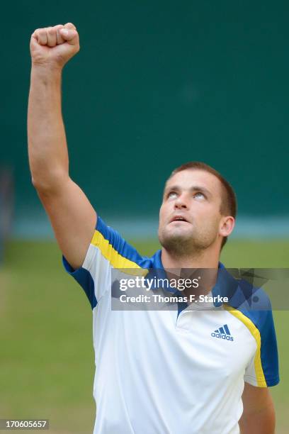 Mikhail Youzhny of Russia celebrates after winning the half final match against Richard Gasquet of France during day six of the Gerry Weber Open at...