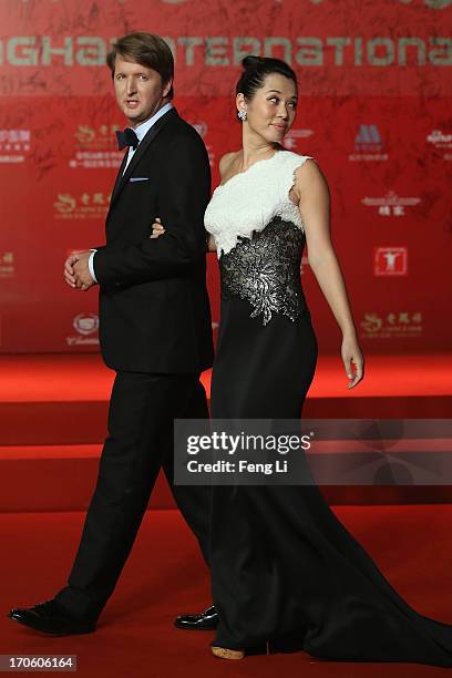 British director Tom Hooper and Chinese actress Yu Nan arrive at the opening ceremony of the 16th Shanghai International Film Festival at Shanghai...