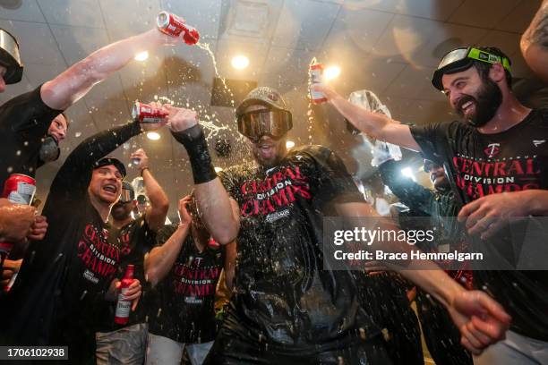 Alex Kirilloff of the Minnesota Twins celebrates with teammates after clinching the AL Central Division against the Los Angeles Angels on September...