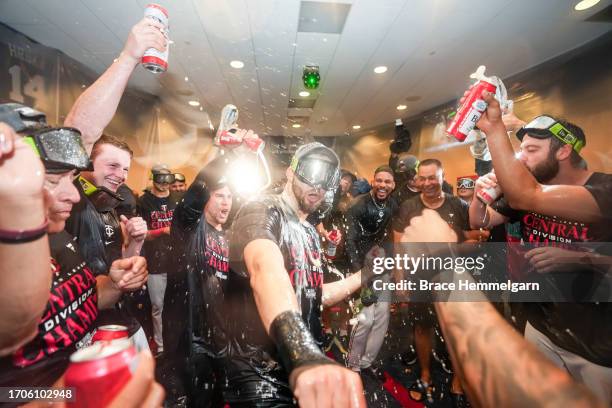 Alex Kirilloff of the Minnesota Twins celebrates with teammates after clinching the AL Central Division against the Los Angeles Angels on September...