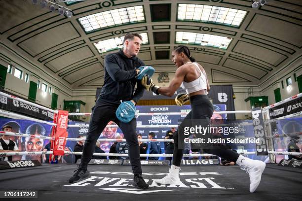 Caroline Dubois works out with trainer Shane McGuigan ahead of her fight with Magali Rodriguez at York Hall on September 28, 2023 in London, England.