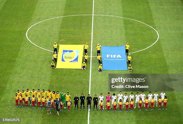 The Brazil and Japan players line up for the national anthems prior to the FIFA Confederations Cup Brazil 2013 Group A match between Brazil and Japan...