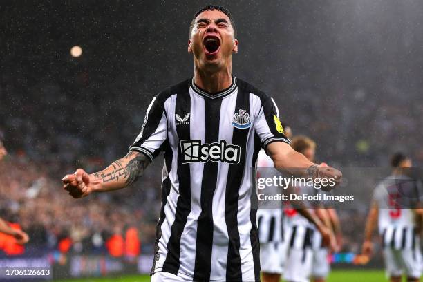 Miguel Almiron of Newcastle United celebrates after scoring his team's first goal during the UEFA Champions League match between Newcastle United FC...