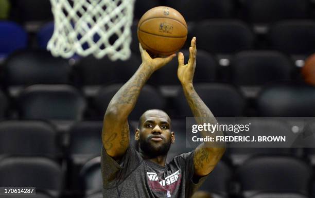 LeBron James of the Miami Heat shoots during a practice session on June 15, 2013 in San Antonio, Texas, a day before game 5 of the NBA finals where...