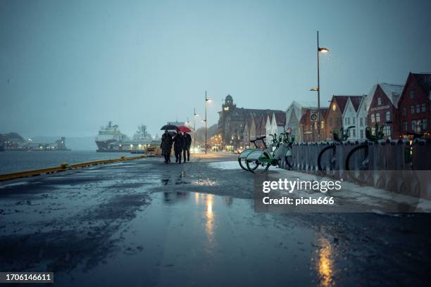 snowing in bergen: typical winter weather in norway - bergen bildbanksfoton och bilder
