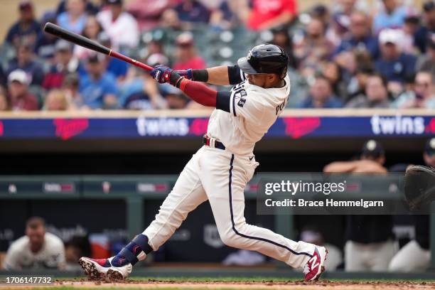 Jorge Polanco of the Minnesota Twins bats and hits a home run against the Los Angeles Angels on September 24, 2023 at Target Field in Minneapolis,...