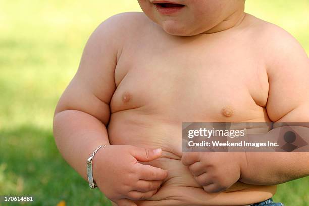 overweight baby - tummy time stock pictures, royalty-free photos & images