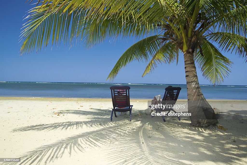 Relaxing on remote beach