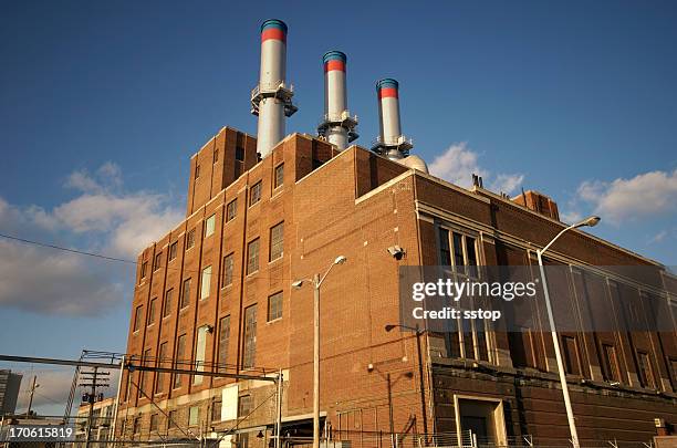 factory from a low angle, geometric - factory building exterior stock pictures, royalty-free photos & images